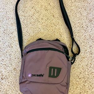 Pac Safe cross body travel purse.